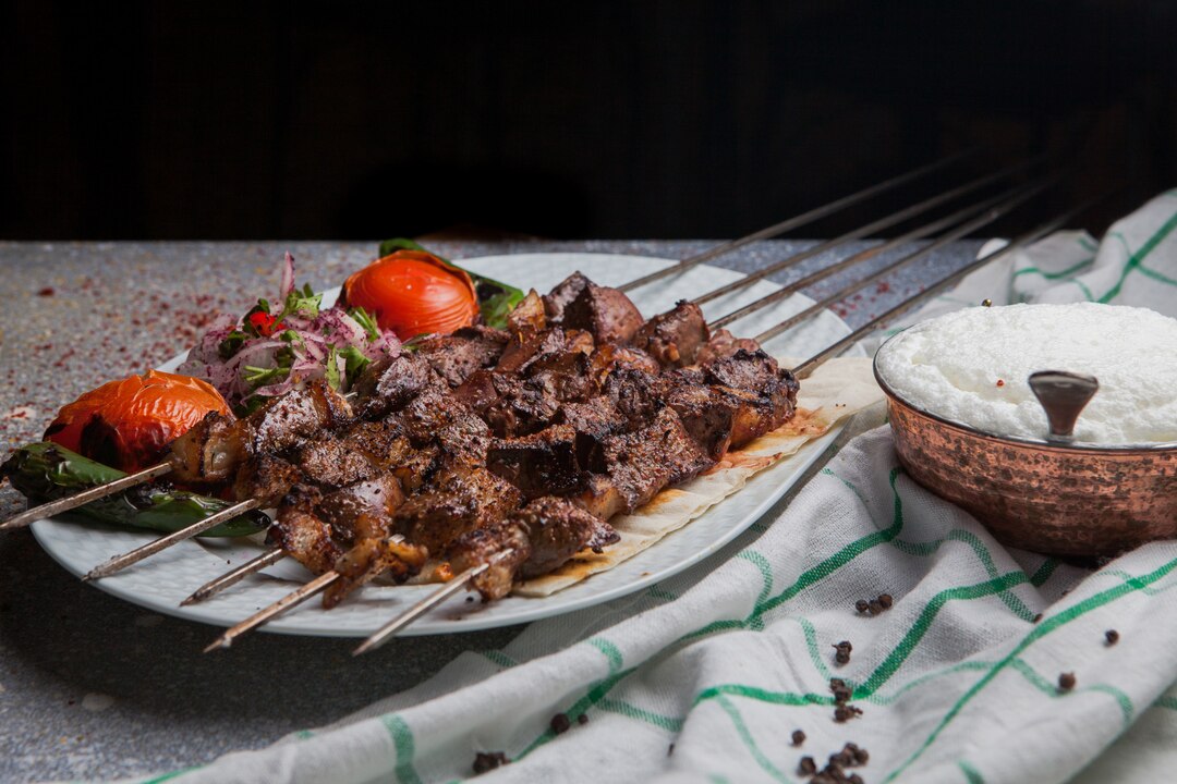 Traditional Omani Mishkak grilled meat skewers with spices